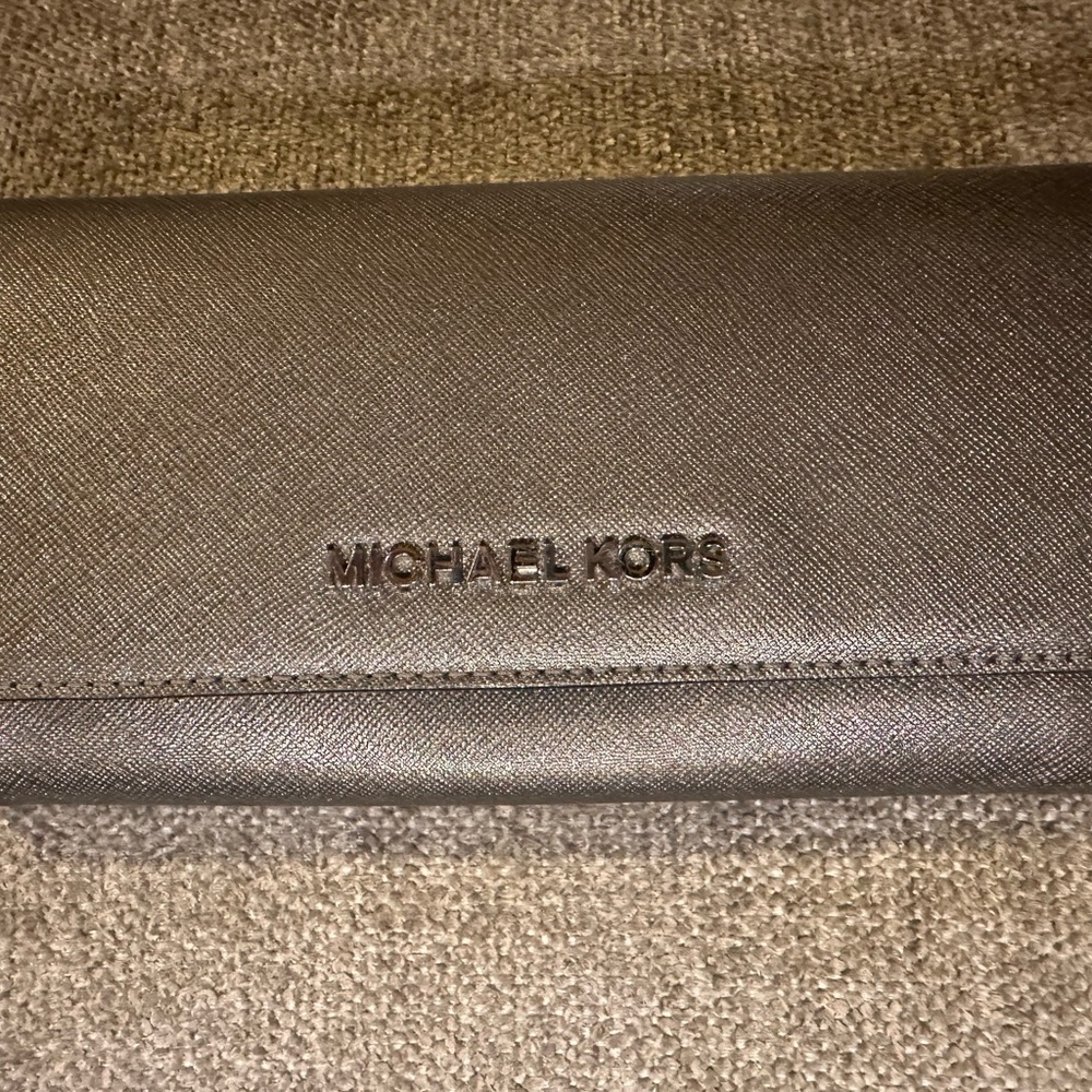 NWOTMichael Kors Large Jet Set Goldish Bronze Wallet  7.5 width 4 inches height